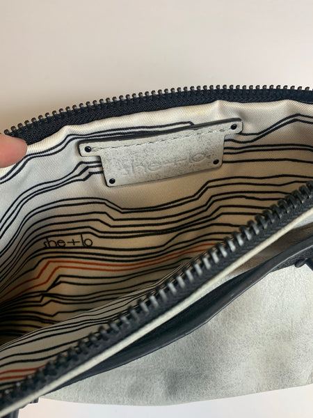 She & Lo Silver Gray Leather Clutch